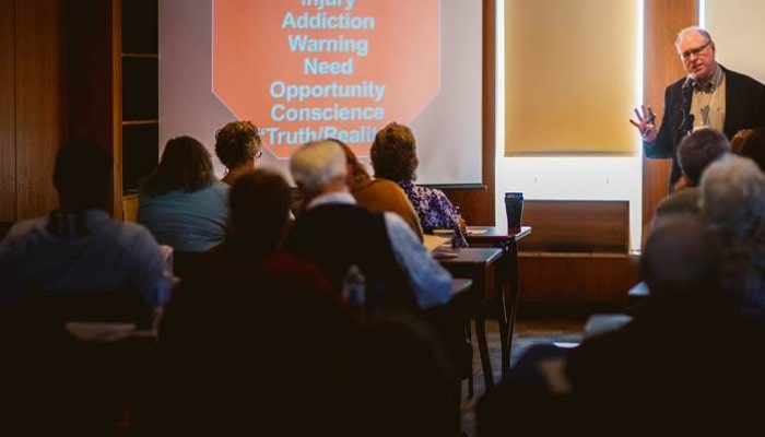 A conference session being held in a Tyndale meeting room